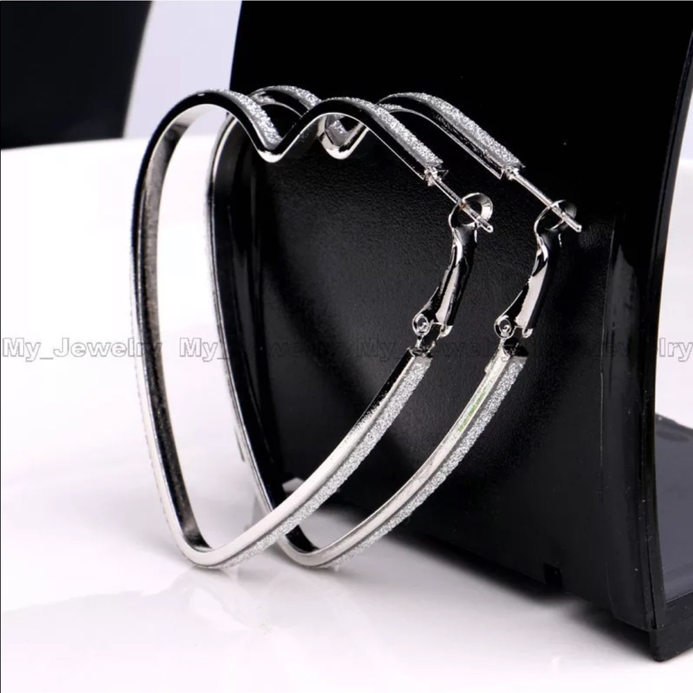 The Beverly Silver or Gold sparkle heart shaped hoop earrings. - Picture 3 of 7